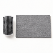 Mewnook Enrichment Kit contents laid out: corner groomer and cut-to-size scratch mat