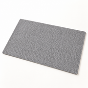 Mewnook cut-to-size scratch mat with adhesive backing on a white studio background
